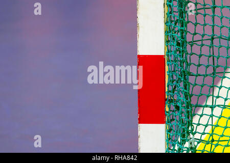 Gate for futsal or handball in gym. Detail of gate frame and net. Outdoor football or handball playground Stock Photo