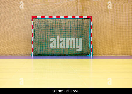 soccer, Futsal or handball goal equipment in a sports hall gym in a school Stock Photo
