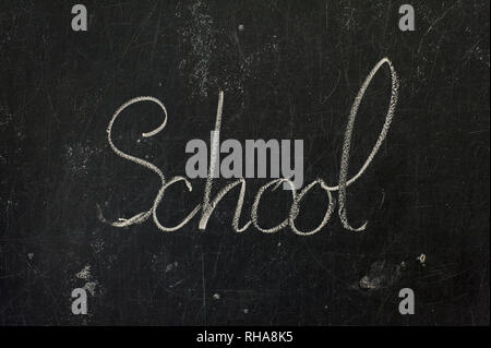 Word SCHOOL written on chalk board Stock Photo