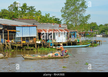 Phong Dien, Vietnam - December 31st 2017. A boat on the river at the Phong Dien Floating Market near Can Tho in the Mekong Delta Stock Photo