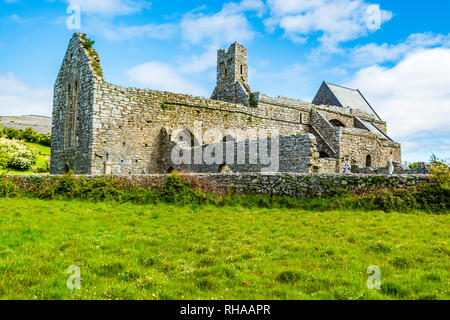 County Clare, Ireland: Corcomroe Abbey ruins (St. Mary of the Fertile Rock), cistercian monastery located near Bellharbour in Glennamannagh and Ballyv Stock Photo