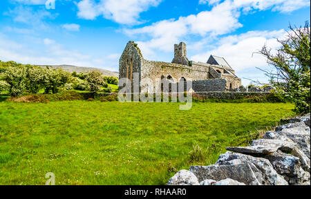 County Clare, Ireland: Corcomroe Abbey ruins (St. Mary of the Fertile Rock), cistercian monastery located near Bellharbour in Glennamannagh and Ballyv Stock Photo