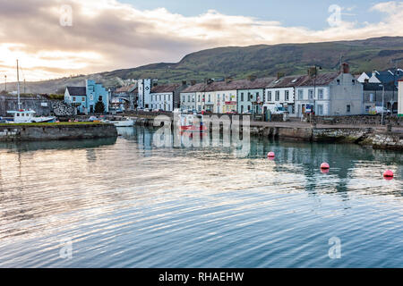 Picturesque port on the shores of Carnlough Bay. Typical village in Northern Ireland. Stock Photo