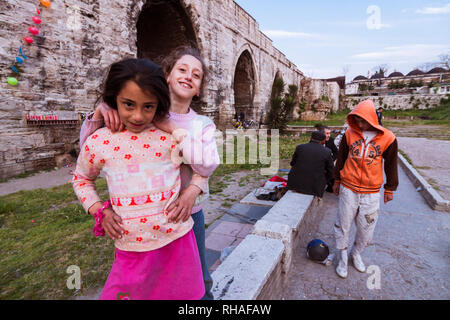 Istanbul, Turkey : Daily life scene under the Aqueduct of Valens, a Roman aqueduct which was the major water-providing system of the Eastern Roman cap Stock Photo