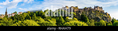 Edinburgh, Scotland, UK - August 25, 2018: Panorama of Edinburgh Castle dominating the skyline of the city of Edinburgh from its position on top of th Stock Photo