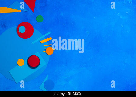 Colorful geometric shapes background. Color blocking and simple forms concept. Suprematic flat lay with copy space Stock Photo