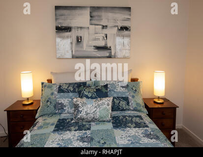 Bedroom homewares of a room with a double bed Stock Photo