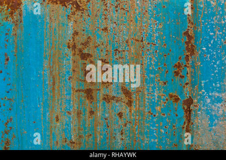 Rusty Metal Background Texture. Rusted, old, vintage, retro background texture on blue metal, steel or iron plate surface. Industrial obsolete concept Stock Photo