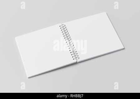 Blank open square spiral notepad on white background. With clipping path around notebook pages Stock Photo