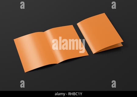 Blank brown open and folded half-folded flyer leaflet on black background. With clipping path around brochure Stock Photo