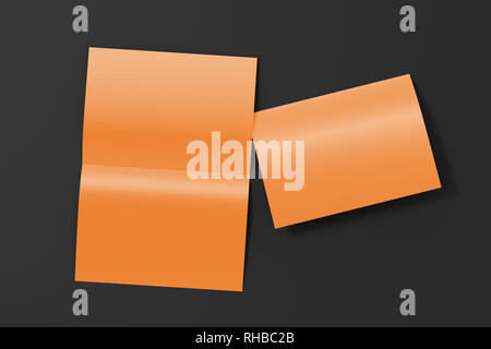 Blank brown open and folded half-folded flyer leaflet on black background. With clipping path around brochure Stock Photo