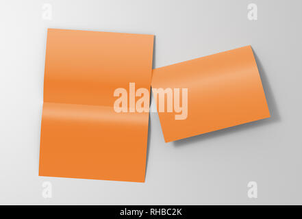 Blank brown open and folded half-folded flyer leaflet on white background. With clipping path around brochure Stock Photo