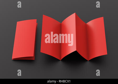 Blank red folded paper leaflet on black background. Eight pages, four panel Stock Photo
