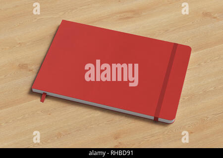 Red horizontal notebook with elastic band on wooden background Stock Photo