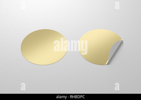 Blank golden round stickers straightened and with folded corner on white background. With clipping path around stickers. Stock Photo