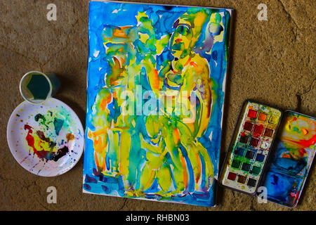 Painting canvas with colors and paints, Maharashtra, India Stock Photo