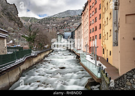 ESCALDES-ENGORDANY, ANDORRA - February 1: River Valira on Engordany Bridge and houses view in a snowfall day in small town Escaldes-Engordany in Andor Stock Photo
