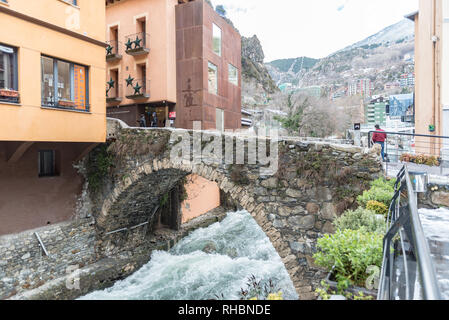 ESCALDES-ENGORDANY, ANDORRA - February 1: River Valira on Engordany Bridge and houses view in a snowfall day in small town Escaldes-Engordany in Andor Stock Photo
