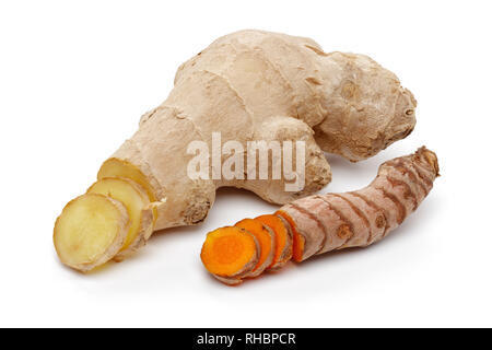 Sliced fresh turmeric and ginger, isolated on white background Stock Photo