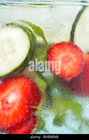 Detox drink with cucumber and strawberries Stock Photo