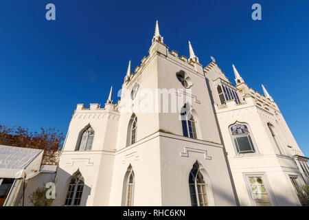 White walls of Strawberry Hill House, a Gothic Revival villa built in Twickenham, London by Horace Walpole from 1749, on a sunny day with blue sky Stock Photo