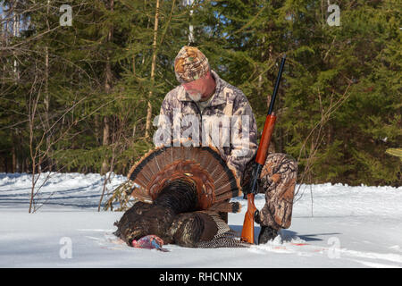 Hunter posing with his spring turkey in northern Wisconsin. Stock Photo