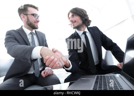 closeup.colleagues shaking hands Stock Photo