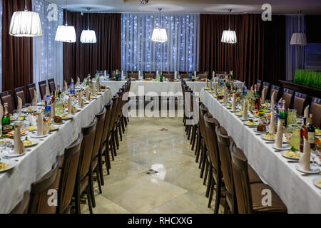 GRODNO, BELARUS - JANUARY 2019: View of the served for decorated wedding dinner table. in elite restaurant Stock Photo