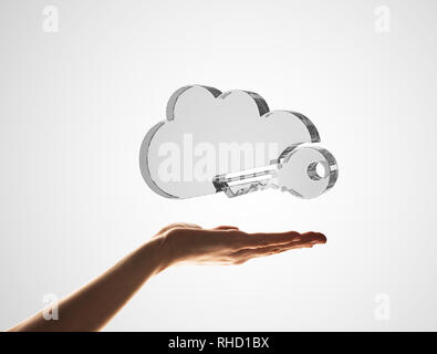 Cloud computing concept with glass symbol shown in hand Stock Photo