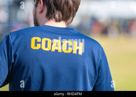 yellow coach shirt