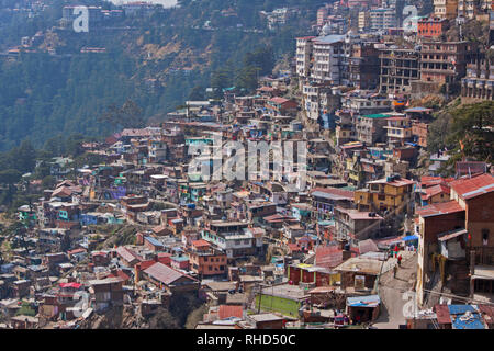 A densely populated hillside in Northern India. Shimla in the foothills of the Himalayas was a summer retreat for the British colonial administration Stock Photo