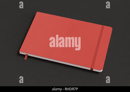 Red horizontal notebook with elastic band on black background Stock Photo