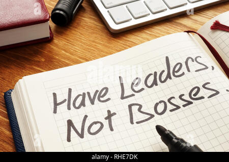 Have Leaders, Not Bosses written in a note. Leadership concept. Stock Photo