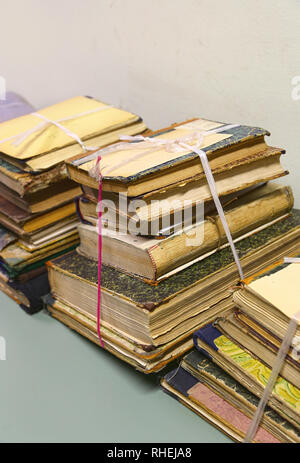 Stacks of very old books Stock Photo