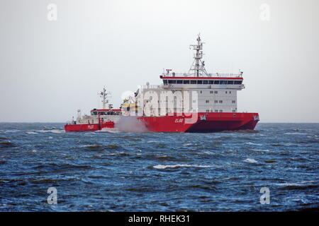 The pilot ship Elbe Pilot waits in front of the port of Cuxhaven on 1 January 2019 for ships. Stock Photo