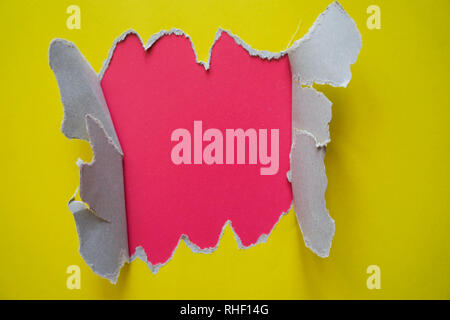 Modern flat lay background with color fragmentary paper. Yellow and pink. Stock Photo