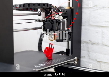 Palm of red plastic, printed on the 3d printer Stock Photo