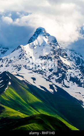 High-mountainous Sharp Rocks Against The Blue Sky And White Clouds.  Caucasus Stock Photo, Picture and Royalty Free Image. Image 87097392.