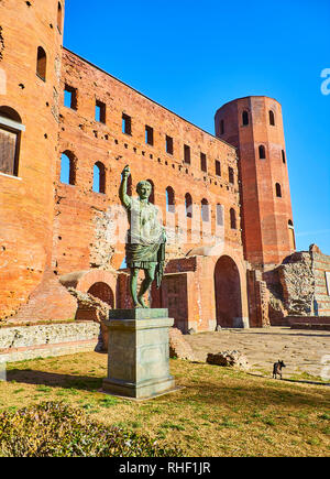 Statue of Augustus Caesar in front of Porta Palatina Gate. Piazza Cesare Augusto square. Turin, Piedmont, Italy. Stock Photo