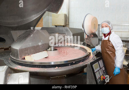 https://l450v.alamy.com/450v/rhf39p/female-worker-controlling-process-of-making-finely-ground-meat-batter-in-bowl-chopper-for-cooked-sausage-and-frankfurters-on-meat-factory-rhf39p.jpg