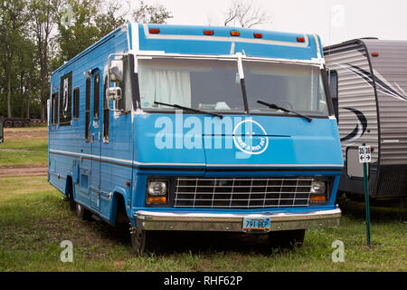 Blue motorhome RV in a campground in North Dakota Stock Photo