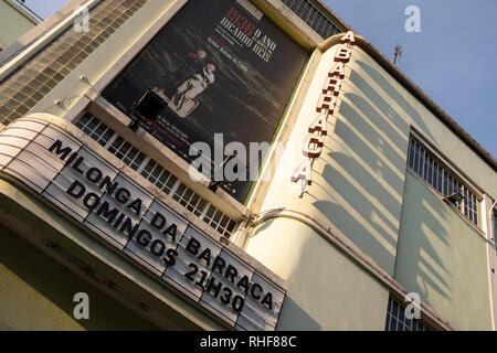 Art deco Abarraca cinema building with retro sign lit by strong sunlight casting shadows across the facade Stock Photo