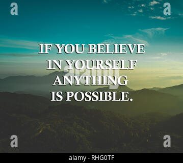 Inspirational life quote with phrase 'if you believe in yourself anything is possible' with mountain background retro style. Stock Photo