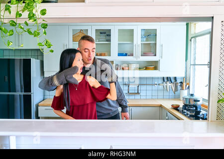 Lovely couple posing - playing the puppet hands Stock Photo