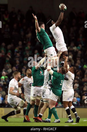 England's Maro Itoje (right) wins the line out ball ahead of Ireland's James Ryan during the Guinness Six Nations match at the Aviva Stadium, Dublin. Stock Photo