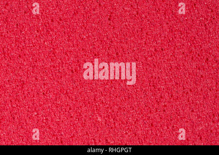 Saturated pink foam EVA texture with relief surface.  Stock Photo