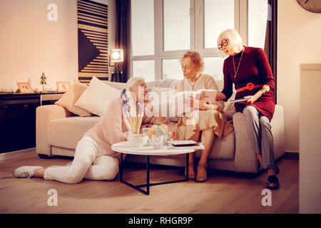 Nice senior women having a book club meeting Stock Photo