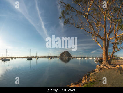 Morro Rock and yachts at Morro Bay State Park, California. January 27, 2019 Stock Photo