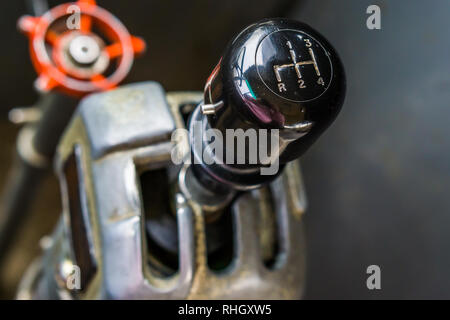 closeup of a old vintage gear shift stick, interior of a retro bus Stock Photo