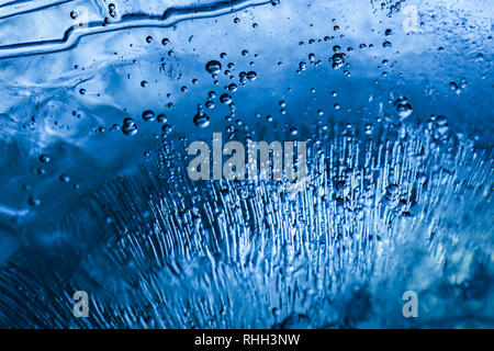 Air bubbles frozen in ice Stock Photo